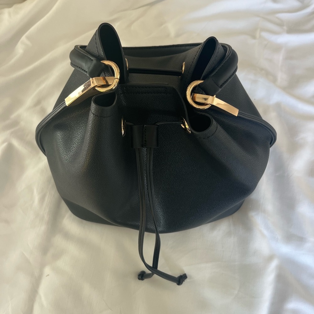 Charming Charlie’s lightly used bag
